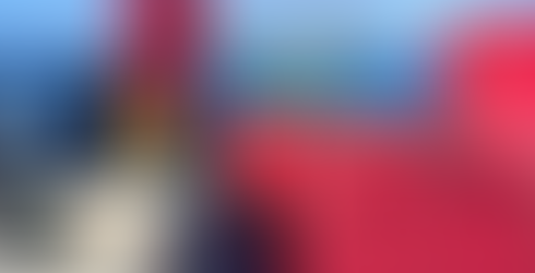 photo of crates on a boat on the sea with a small island in the distance