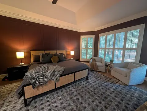 Interior bedroom with dark feature wall painting – Southern Pines, NC