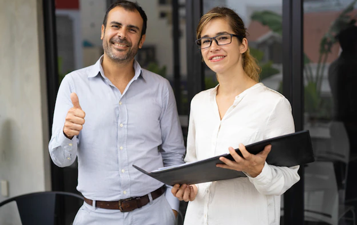 portrait-successful-team-young-woman-mid-adult-man_1262-18008.png