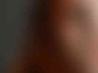 Image showing a pierced eyebrow being cleaned, related to aftercare guidance.