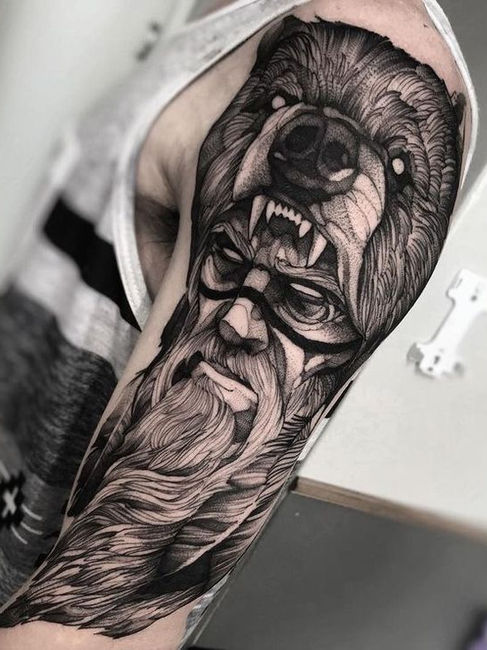 Norse mythology tattoo featuring symbolic runes, gods, and amulets