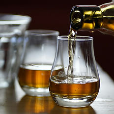 Whisky pouring in a speyside distillery.