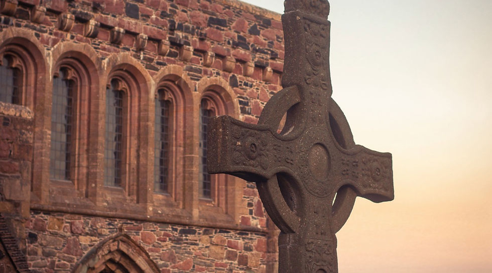 Picture of St Martin's Cross, an original 8th century stone monument outside Iona Abbey. 