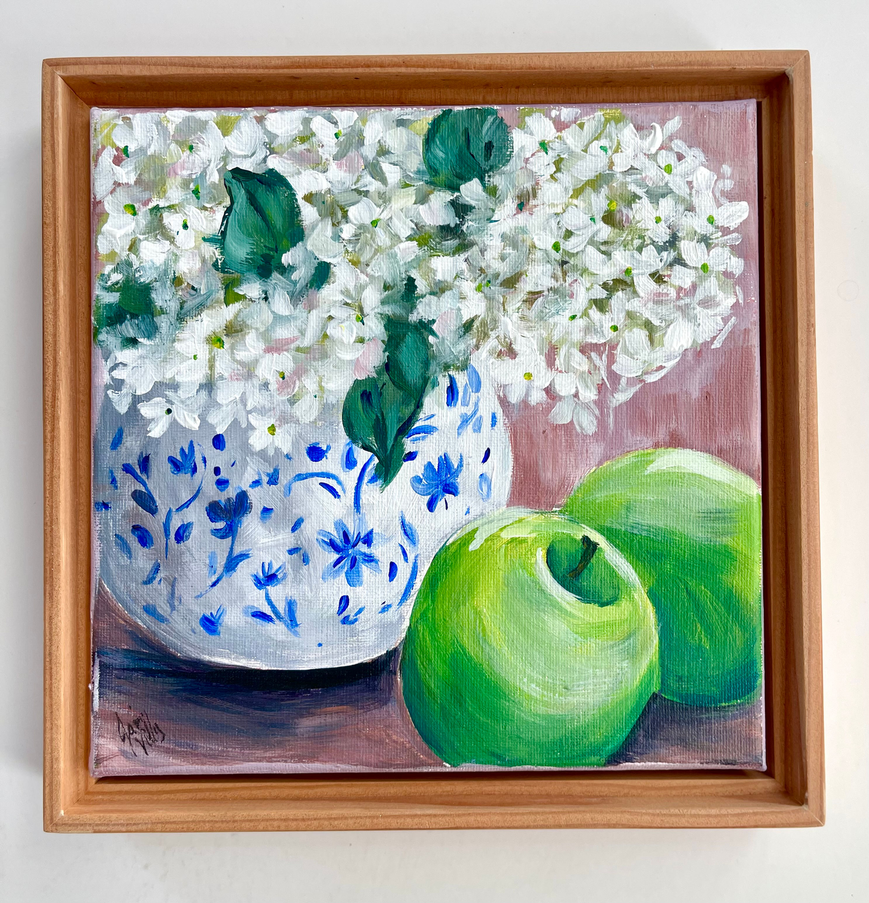 White Hydrangeas in blue/white Vase w/Apples