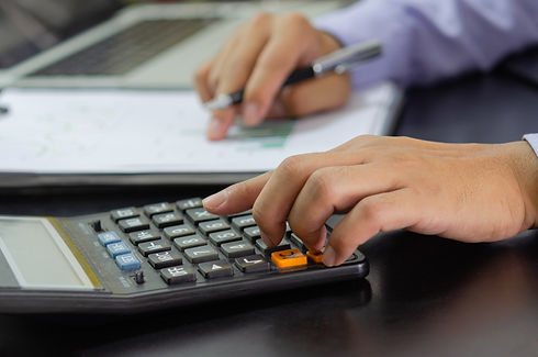 businessman-hand-pressing-calculator-business-finance-tax-investment-concept.jpeg