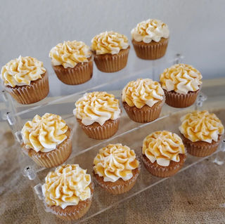 Caramel drizzled cupcakes on three tiered stand