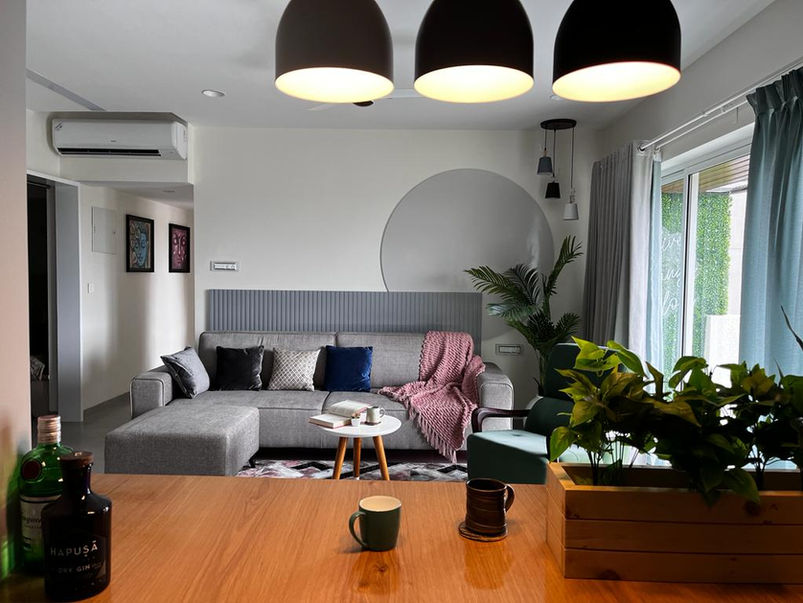 Architectural detail highlighting the intersection of glass, steel, and stone materials.