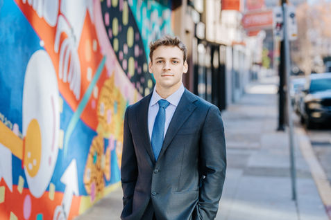 Professional executive headshot of a business professional in downtown San Francisco, photographed with natural light and a m
