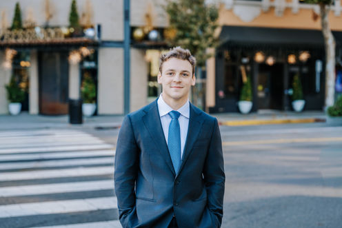 Professional executive headshot of a business professional in downtown San Francisco, photographed with natural light and a m