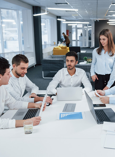 guy-left-side-talking-colleagues-is-listening-him-group-young-freelancers-office-have-conv