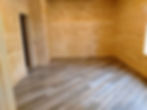 Floating Luxury Vinyl Plank flooring installed at a 45 degree angle on concrete with a moisture barrier in Blairsville, Georgia. LVP, Luxury Vinyl Plank