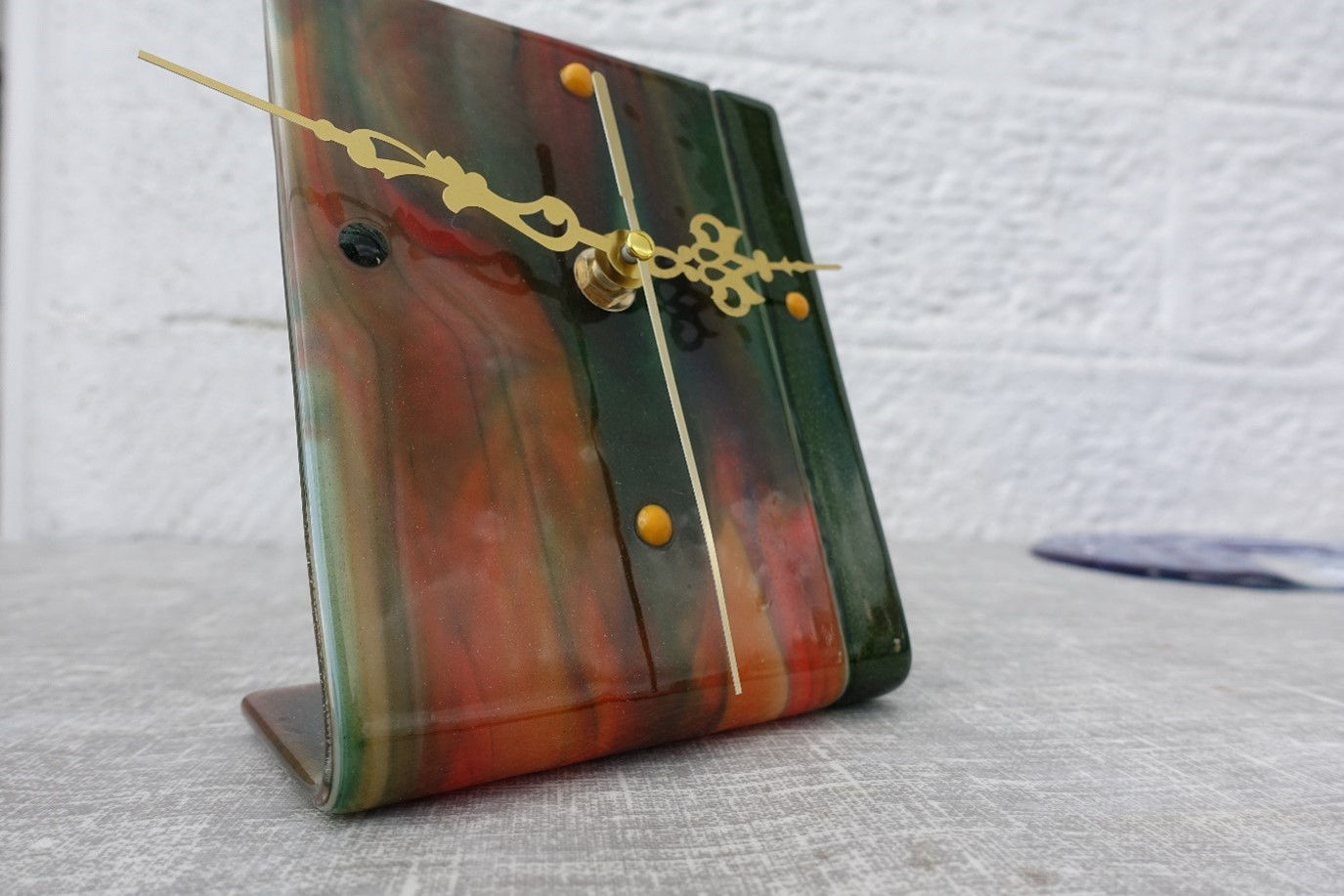 Brown and Green Stand Alone Clock