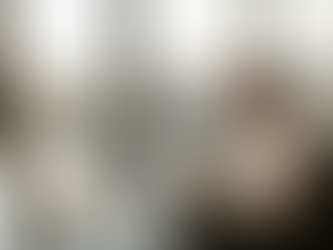 Business owner reviews tax documents in office