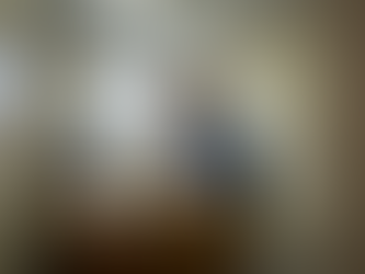 Bookkeeper at desk reviewing small business financials