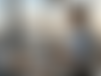 Accountant using software at corner desk, city view