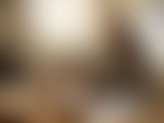 Business owner checks cash flow spreadsheet at table