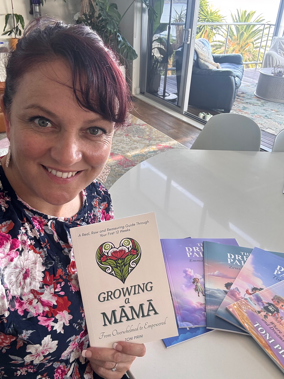 Author Toni Pirini holding her book Growing a Mum with The Dream Palace childrenâs bedtime story series