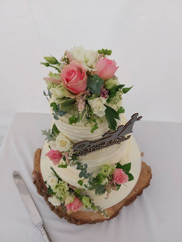 Beautiful semi naked textured buttercream wedding cake 
