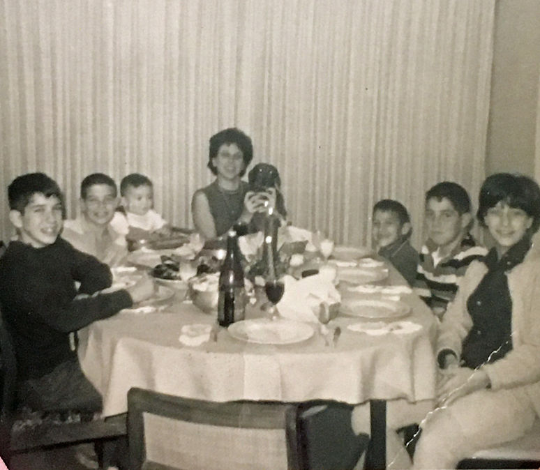 Gail (far right) and her brothers and mom.jpg