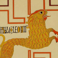 An image shows a colorful red and yellow line drawing. Pulled from the page of book of facsimilies of 9th century illuminated manuscripts, the image shows a lion, mid-jump in the center of the page. A simple red boxed pattern decorates the page behind the figure of the lion.