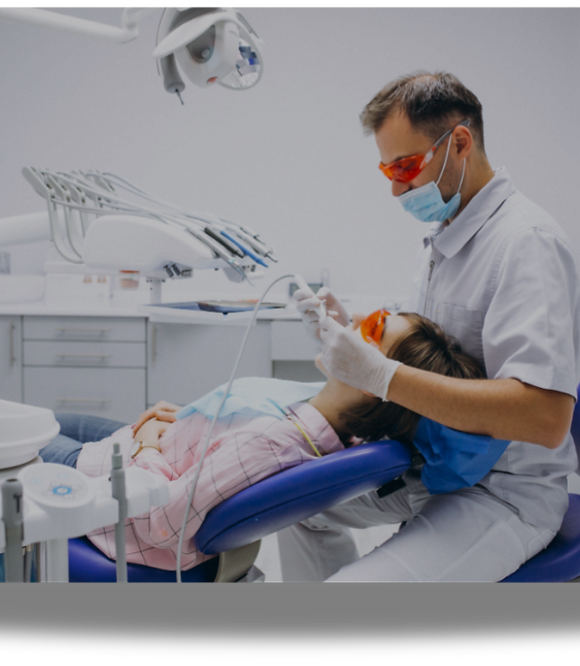 Dr Yasir Obaidi working on a patient