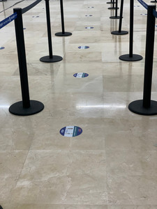 Floor markers are a gentle reminder to stay physically distanced.