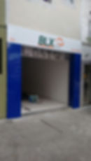 Fachada em ACM com letras em adesivo