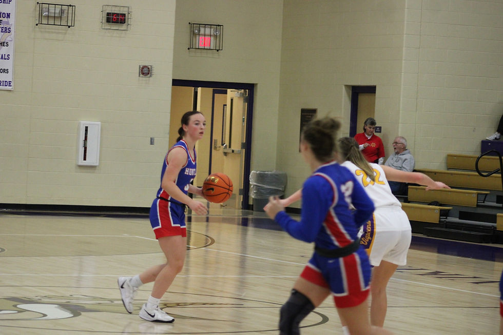 Kinsley Kilpatrick drives the ball up the court in a File Photo from earlier in the season. (Photo Credit: Cindy Wiseman, Permission granted to use by ESPN Winchester.)