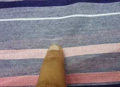 Barré defect on dyed nylon carpet — transverse banding caused by uncontrolled dye strike rate on variable AEG nylon BCF