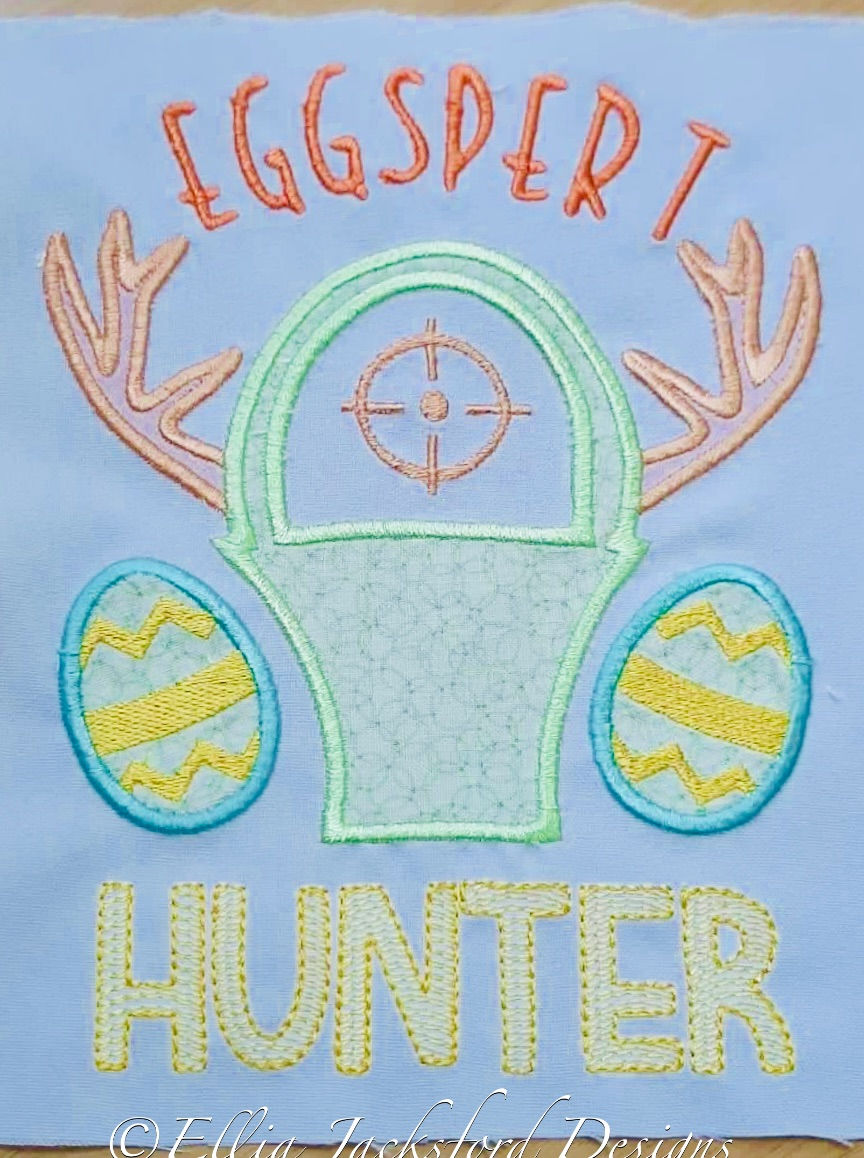 Thumbnail: Eggspert Hunter Easter Embroidery Design 3 SIZES