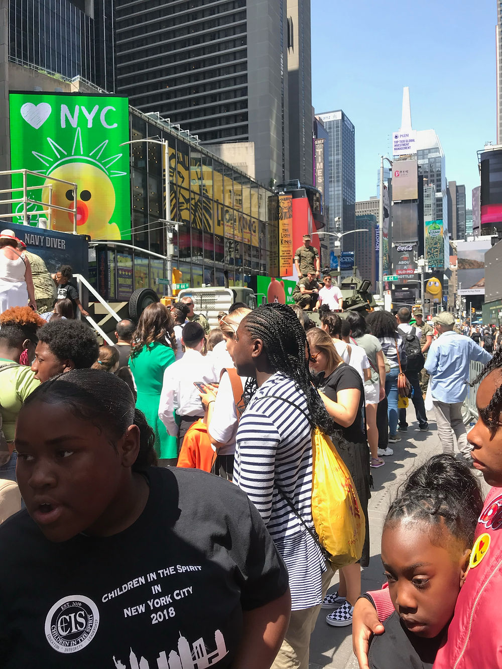 Students exploring busy Times Square, NYC.