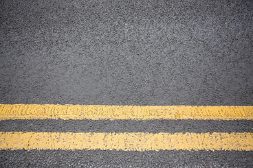 Yellow lane dividers on road
