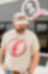 Red Plains Grand Butchery worker wearing company t-shirt and hat
