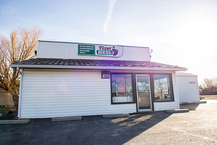Tizer meats brick and mortar building