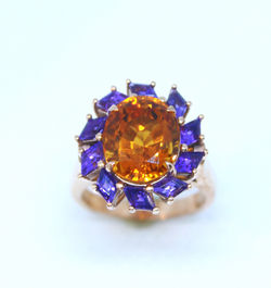 Ring in 18kt pink gold with an Amethyst  and Citrines