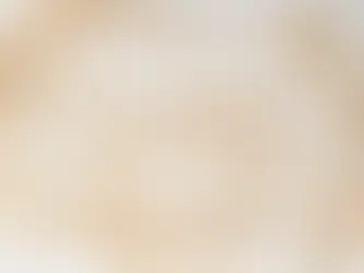 Scrabble tiles spell "OZEMPIC" on a marble surface, surrounded by scattered letters forming partial words like "DIAB" and "LAO."