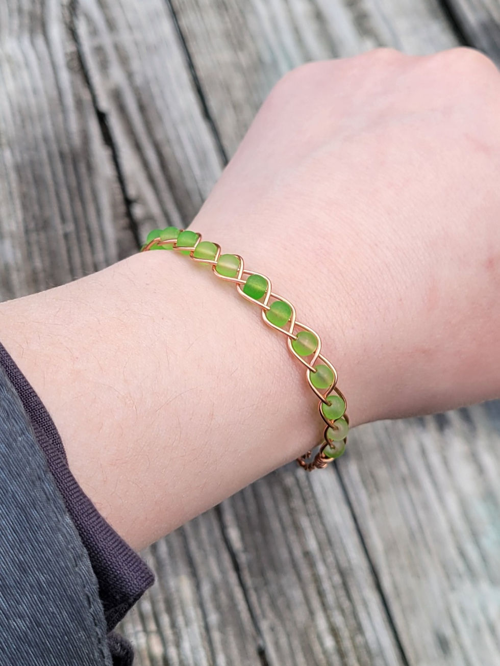 Thumbnail: green glass beaded weave bracelet top view