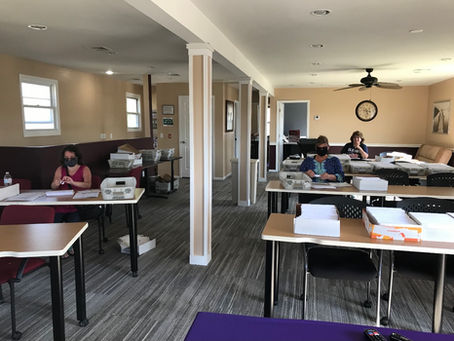Volunteers at work at LICCV, to help get the word out on how to protect Children and Families digitally during COVID-19.