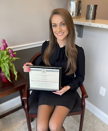 Erica L. Alter, Esq holding million dollar advocates award for lawyers. Best personal injury lawyer in long island new york for car accidents, motorcycle crashes and body injuries