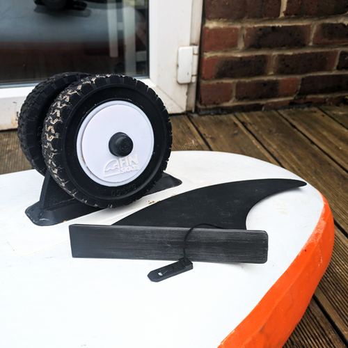 Slide-in wheels installed in fin box