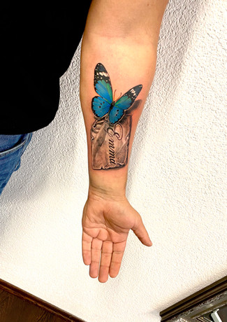 BUTTERFLY WITH CHILD NAME ON RIGHT ARM