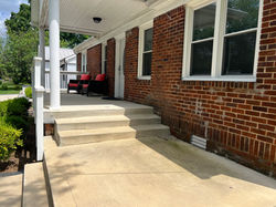 Large deep front porch with two levels