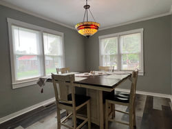 Large dining table that seats four people.