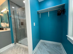 Large walki-in closet past the walk-in shower