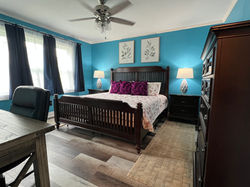 Large master bedroom with a King bed.