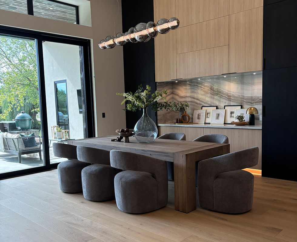 Warm Modern Interior Design with sculptural lighting and natural wood dining table