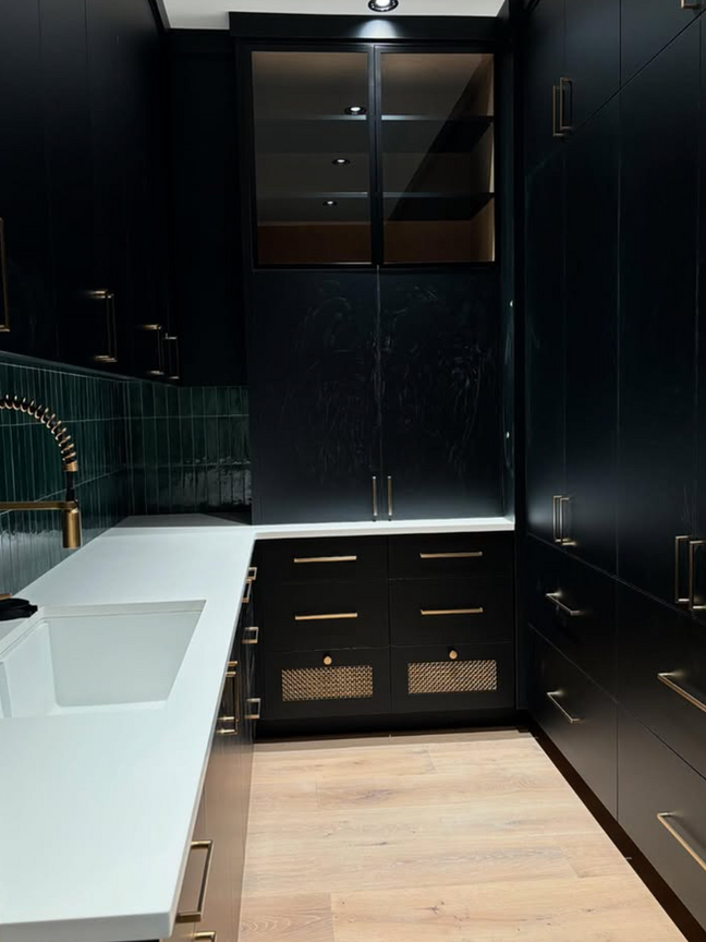 gorgeous black pantry in modern farmhouse custom home