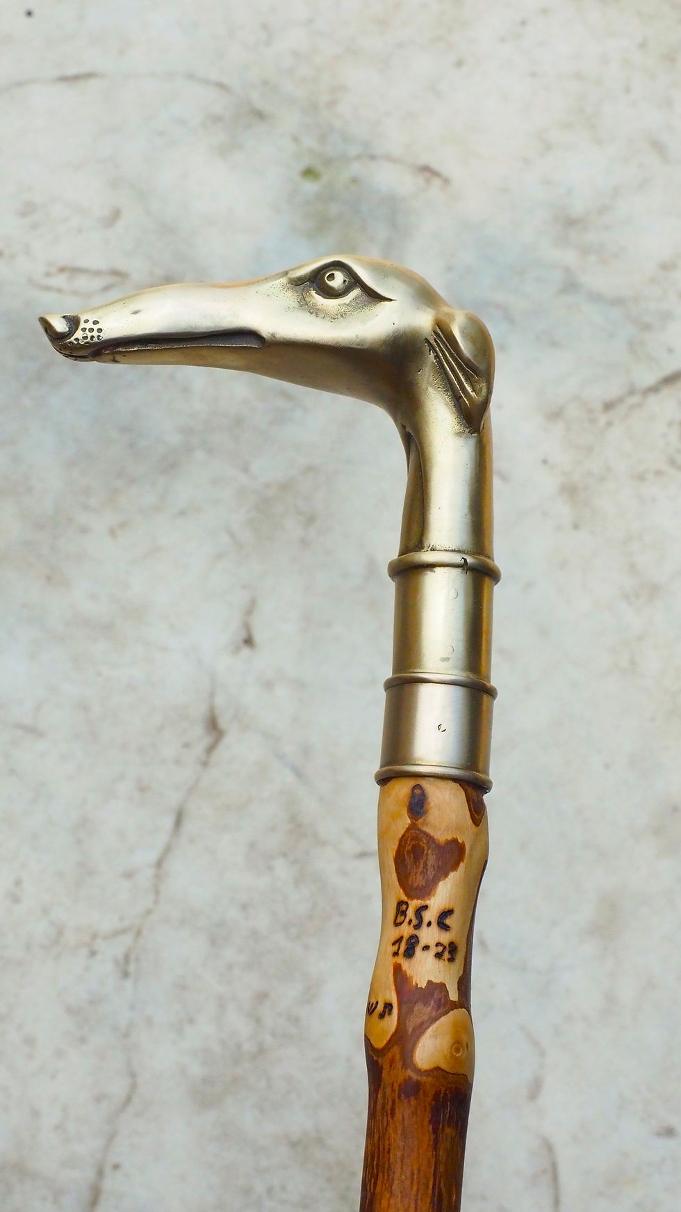 Thumbnail: olive wood "wind dog " brass handle cane