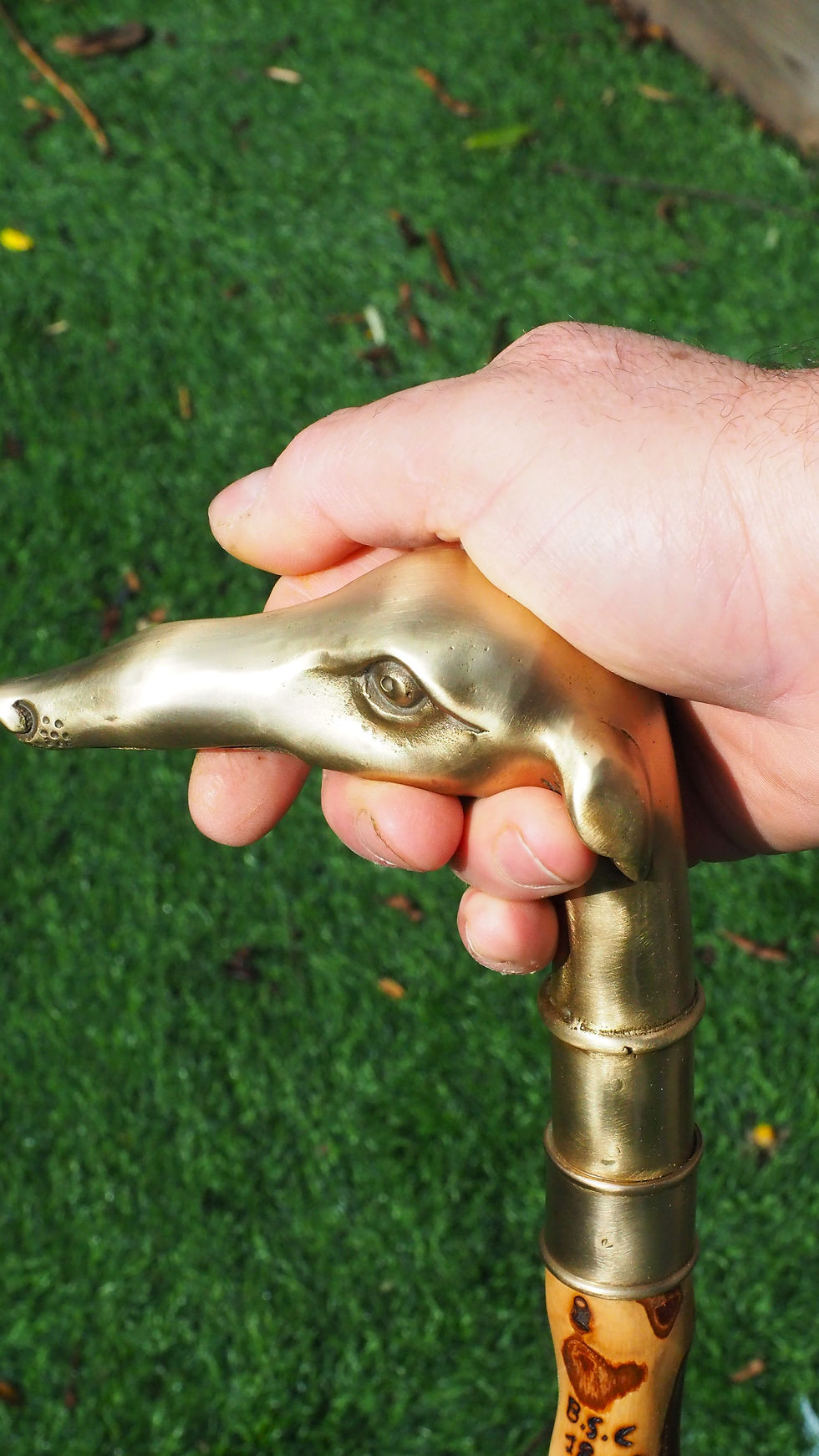 Thumbnail: olive wood "wind dog " brass handle cane