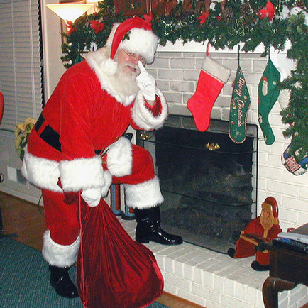 Santa Claus sneaking in presents